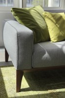 Fellow sofa, showing arm and stitching detail.